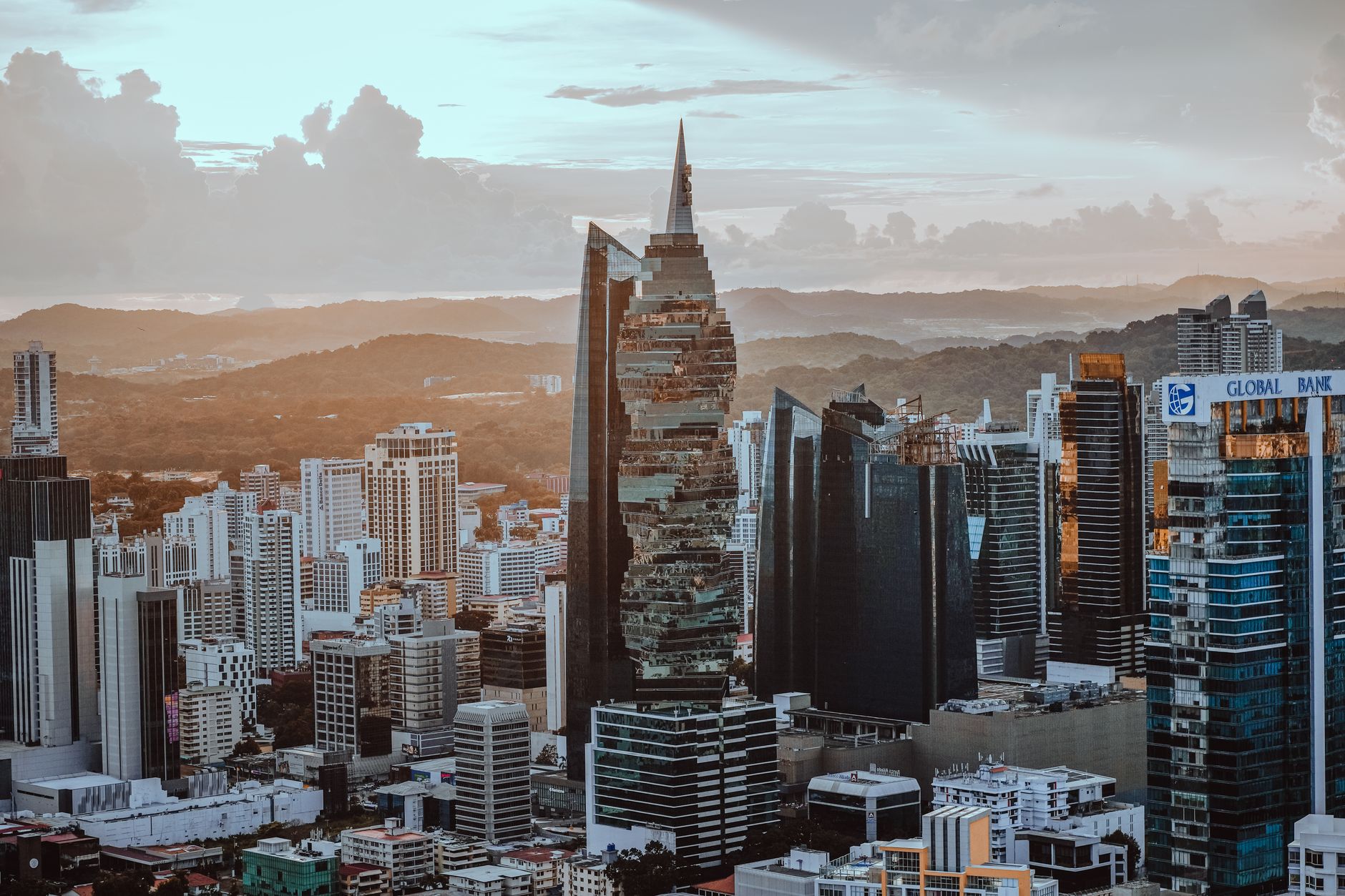 A stunning panoramic view of Panama City's skyline at sunset featuring contemporary skyscrapers.