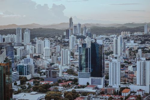 Free Aerial view of Panama City's bustling skyline featuring modern skyscrapers and urban architecture. Stock Photo