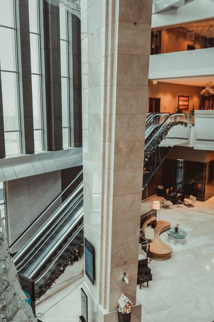 modern luxury hotel lobby interior with neutral tones