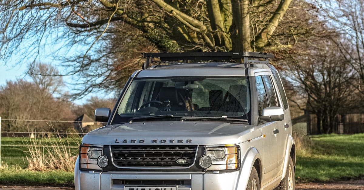 Land Rover SUV Car on a Countryside Road · Free Stock Photo