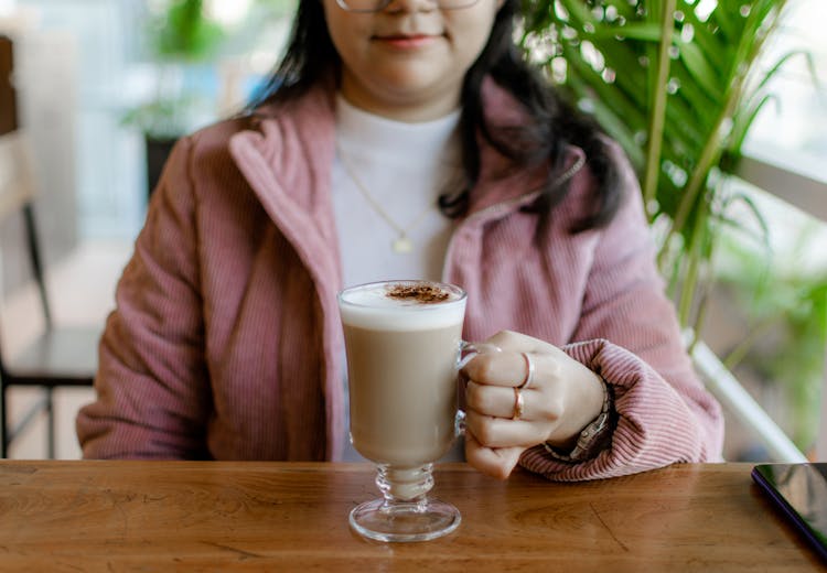 Woman Holding Coffee Cup