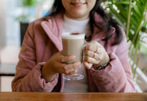 Close up of Woman Holding Coffee Cup