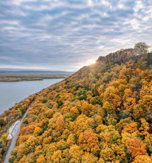 Free Aerial view of vibrant fall foliage along the Mississippi River in Reads Landing, Minnesota. Stock Photo