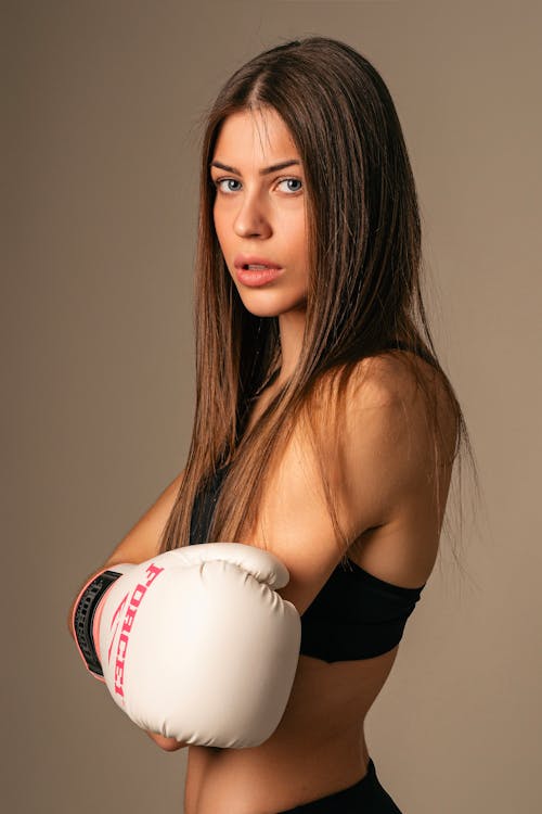 Portrait of Beautiful Woman with Boxing Gloves