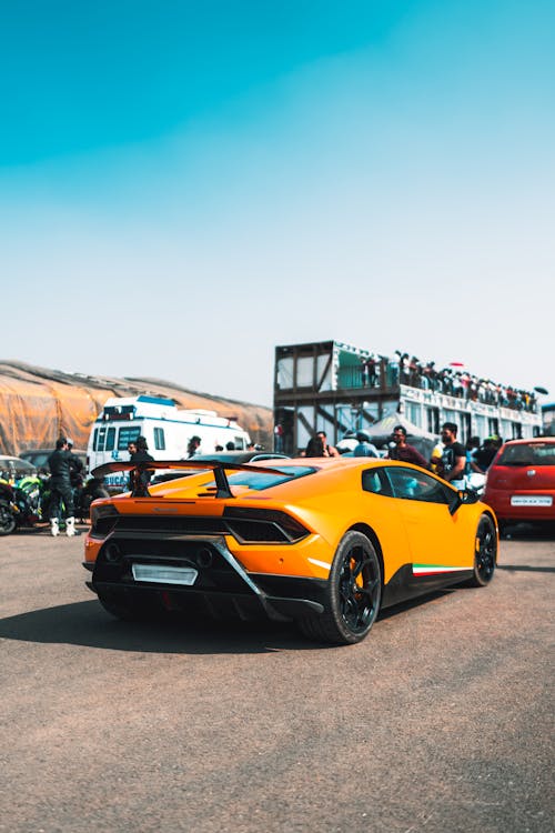 Photo of A Yellow Car parked on Road