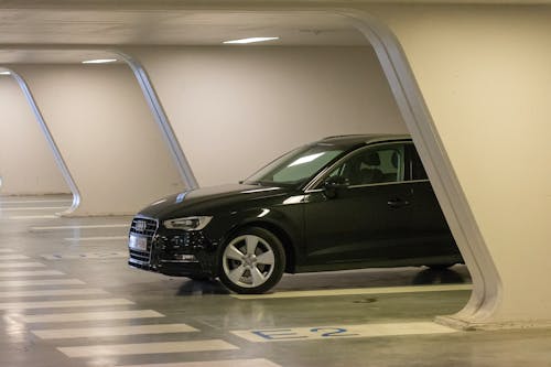 A Black Audi A3 Parked in an Underground Garage 