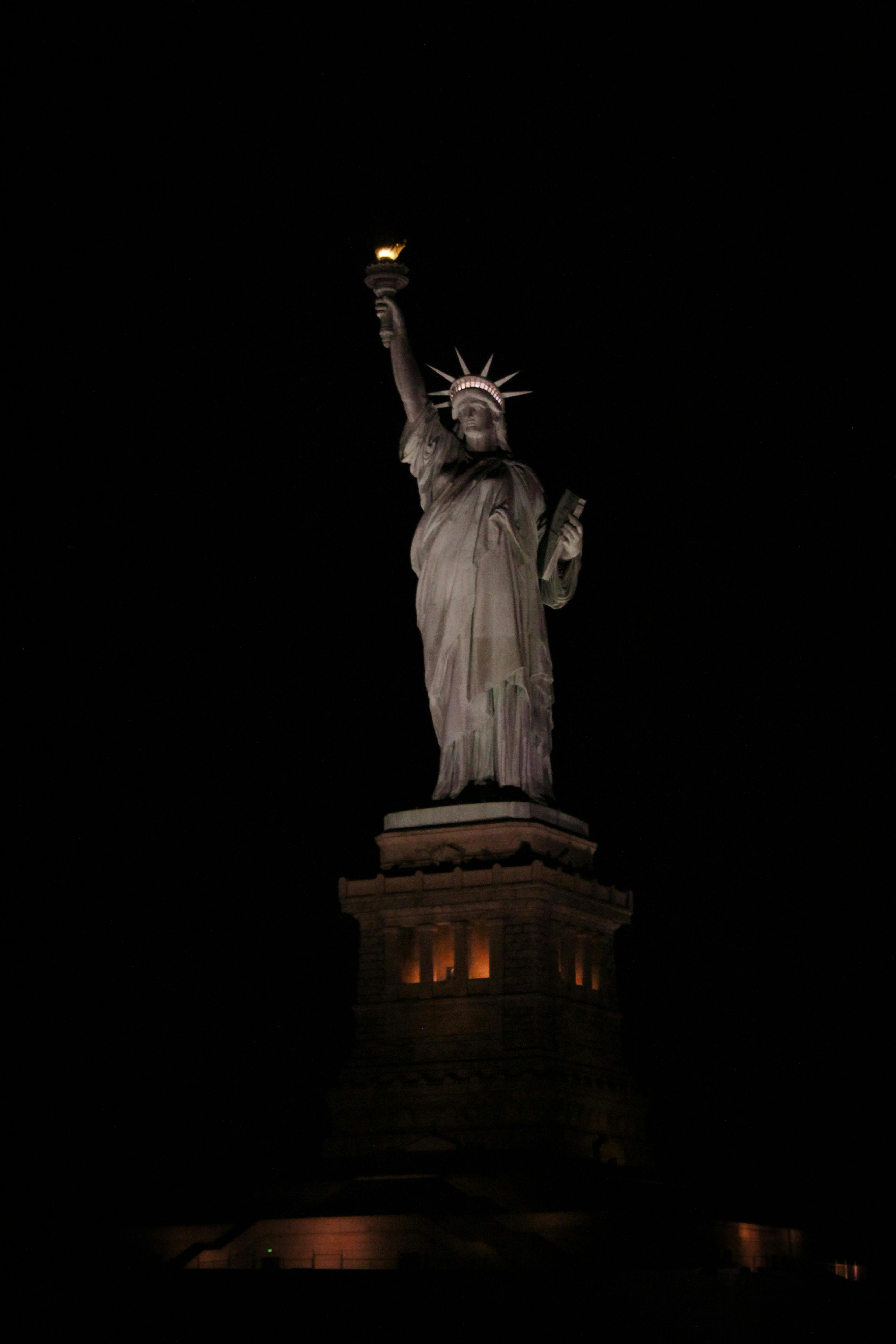 statue of liberty against night sky