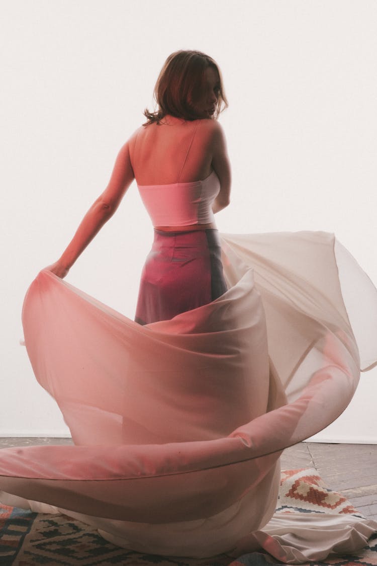 Woman Dancing With Tulle At Home