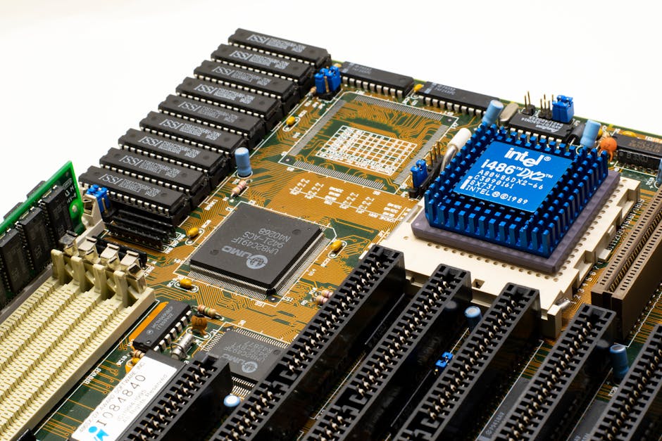 Close-up of vintage Intel 486DX2 CPU on a classic motherboard with electronic components.