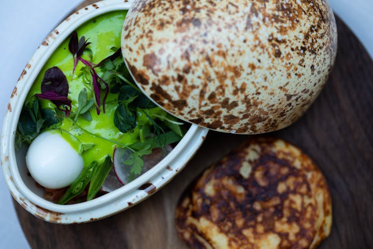 Vegetable Salad With Pesto Sauce In Pottery