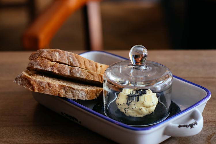 Photo Of  Sliced Loaf Bread And Butter