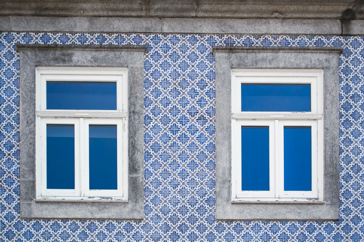 A blue-tiled Portuguese building facade.