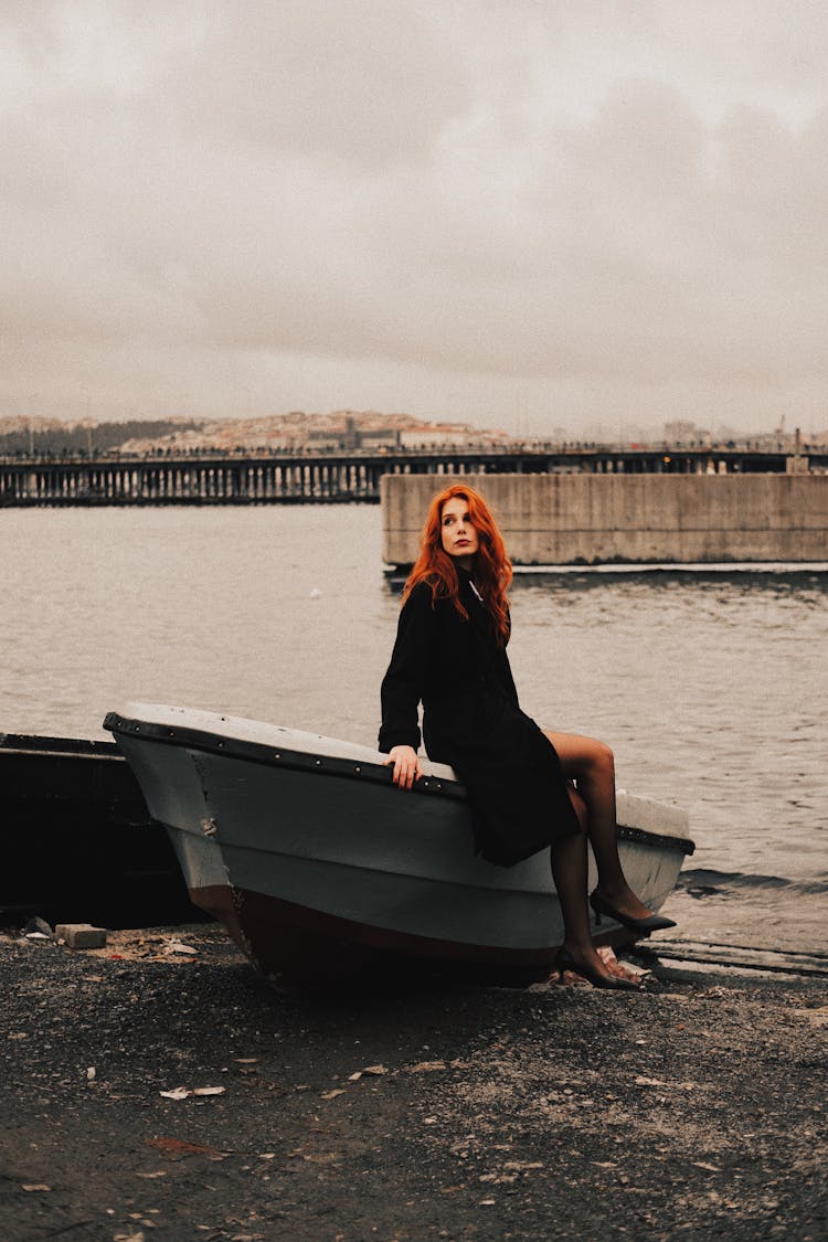 Woman Posing By Boat In City