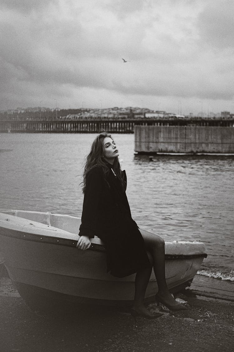 Woman Posing On Boat In Black And White