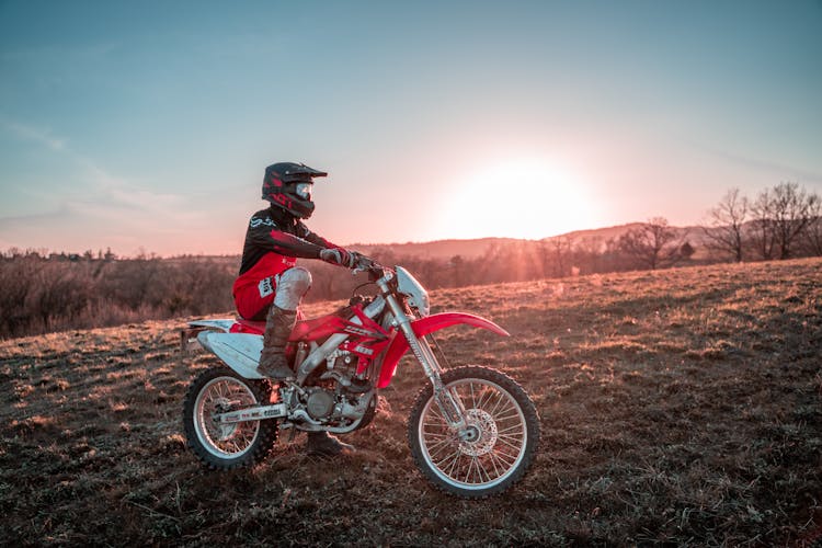 Rider On Motorbike At Sunset