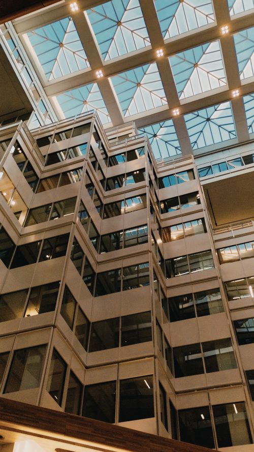 Free A modern office building interior with glass ceiling in Washington, DC. Stock Photo