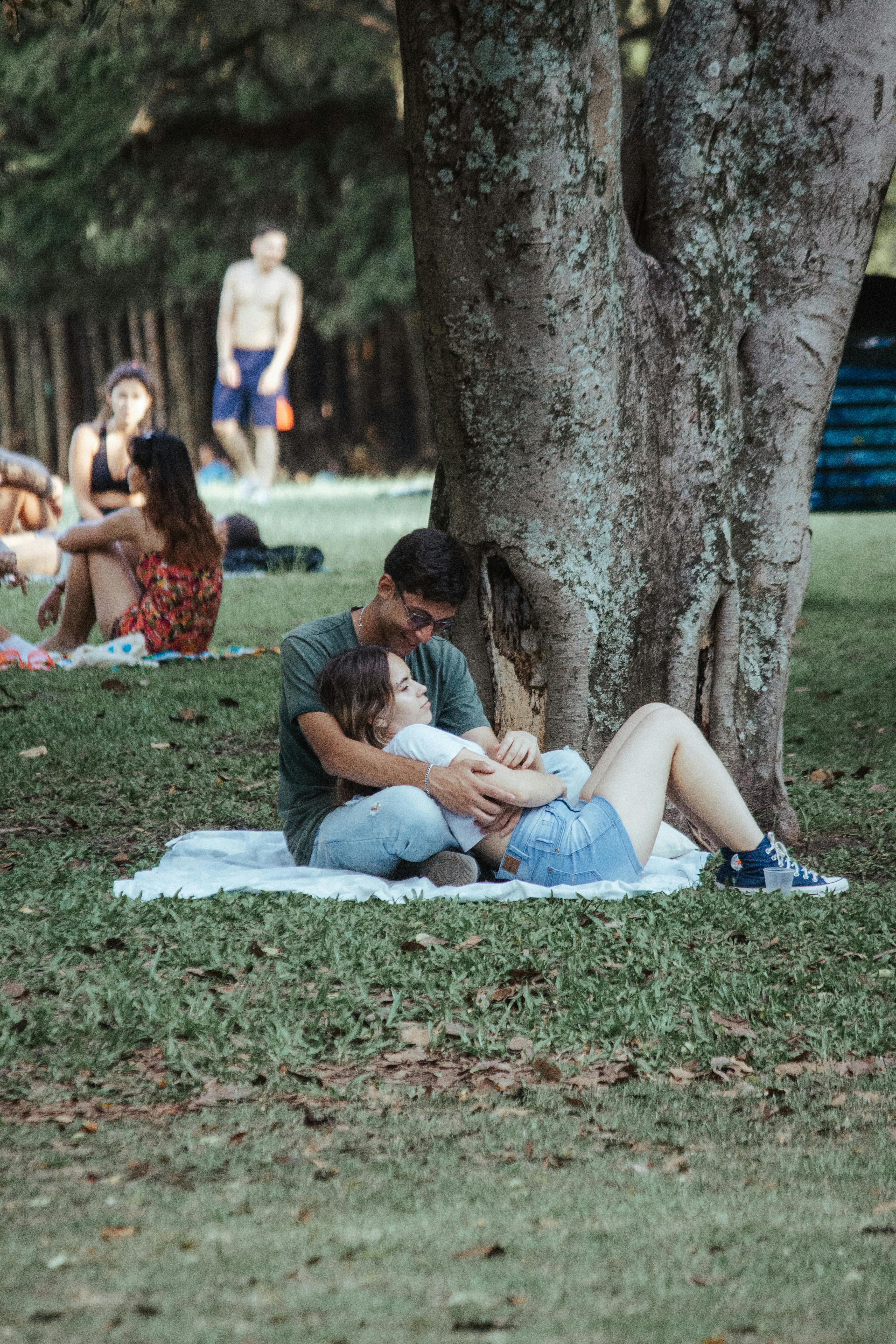 Couple on Blanket in Park · Free Stock Photo