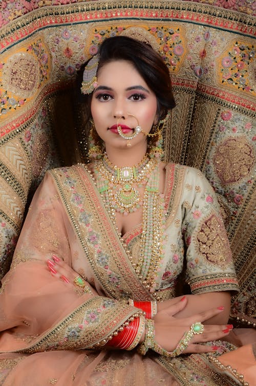 Woman in a Traditional Dress and Jewelry 