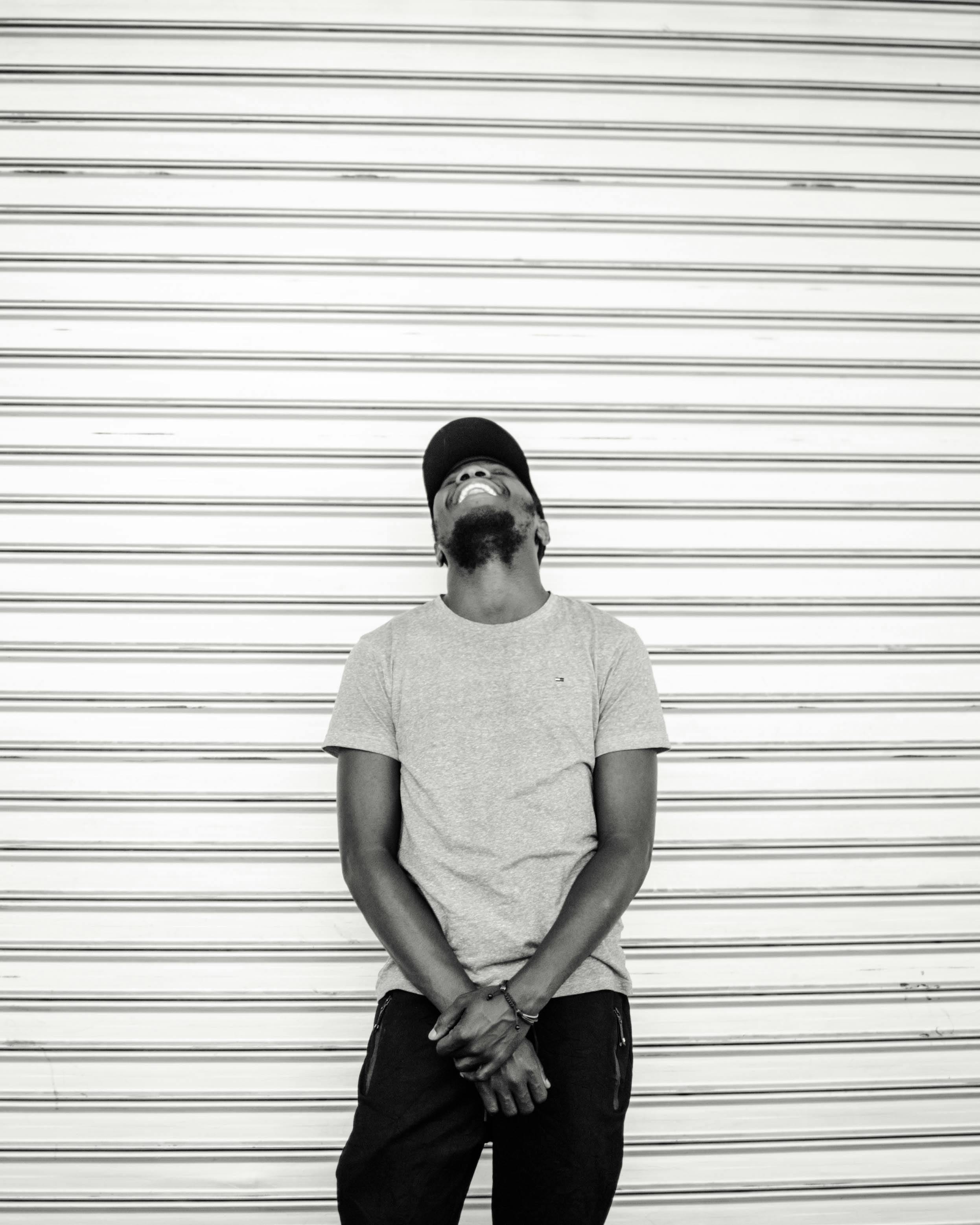 monochrome photography of person laughing