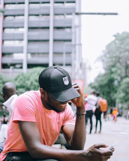 Photo of Man Using His Cellphone