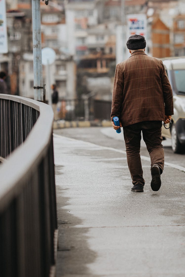 Man Walking On Street