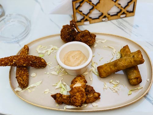 Finger Food with dip Sauce in a Plate