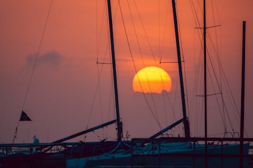 A Sunset over Sailboats