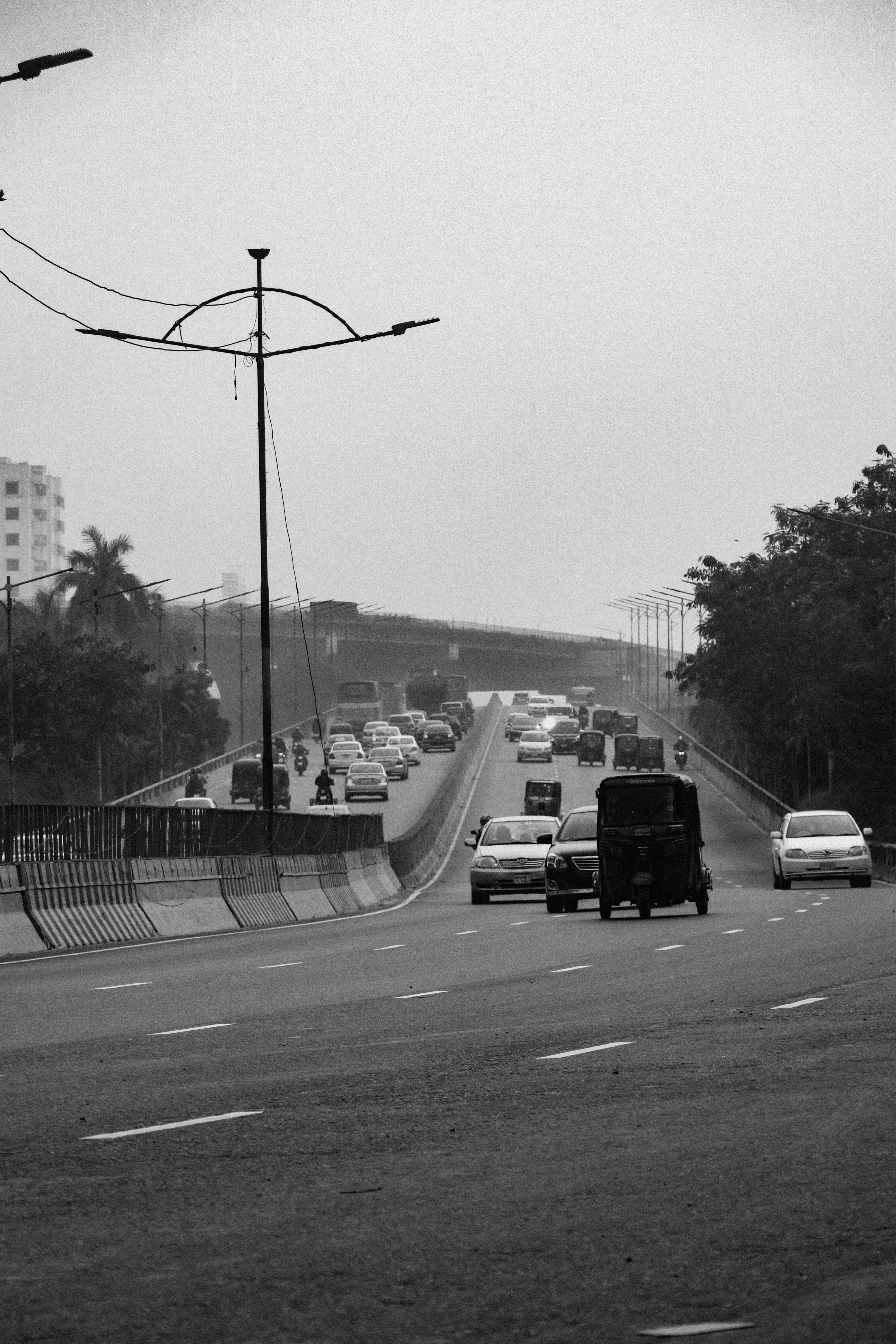 Grayscale Photo of a Vehicles on the Highway · Free Stock Photo
