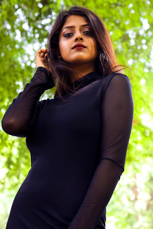 Low Angle Photo of Woman Wearing Black Dress