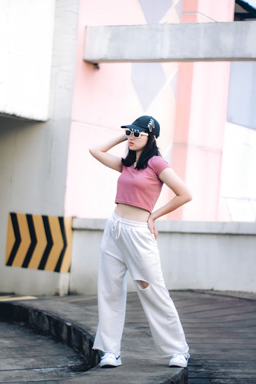 Woman in Pink Shirt Posing