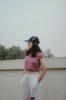 Young woman posing outdoors in casual fashion, Cimahi, Indonesia.