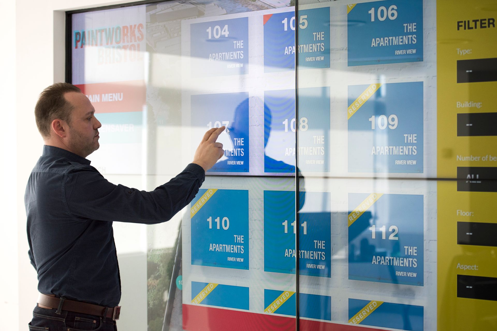 Man Showing Apartments Numbers