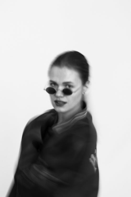 Blur Photo of Woman With Sunglasses 