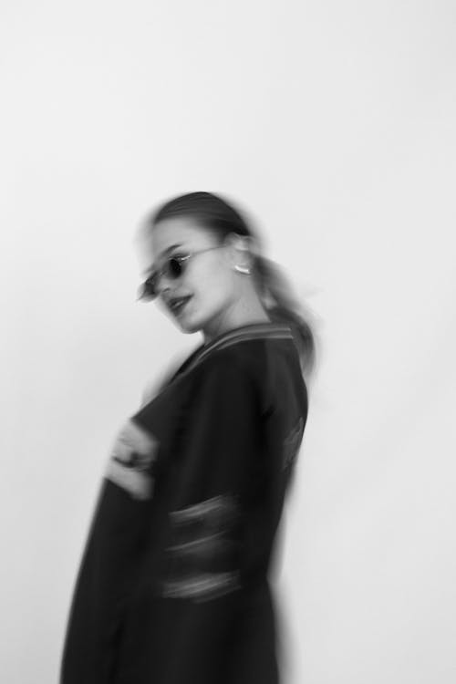Grayscale Photo of Blur Women With Sunglasses 