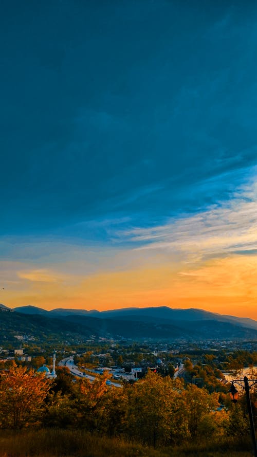 Foto d'estoc gratuïta de bell cel, blau, capvespre