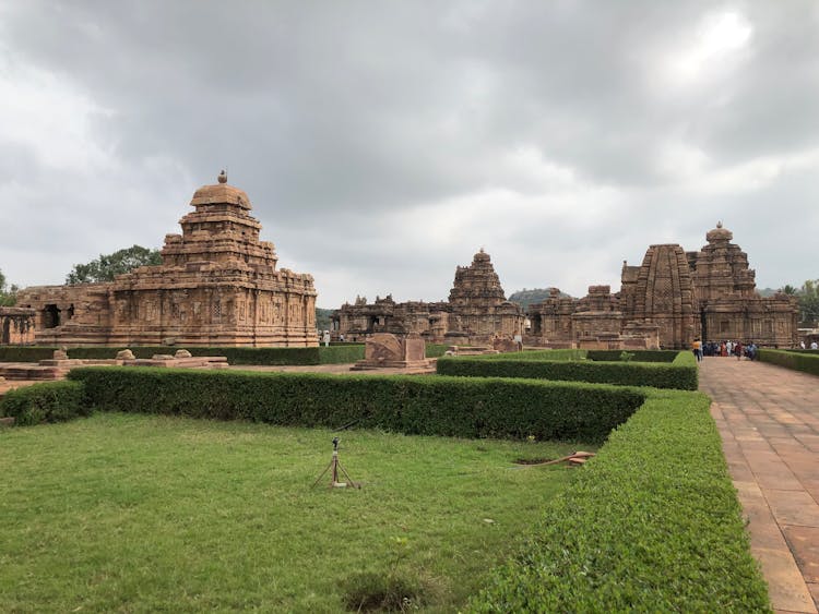 Tourists Visiting The Ancient Sir Virupaksha Hindu Temple In Pattadakal India