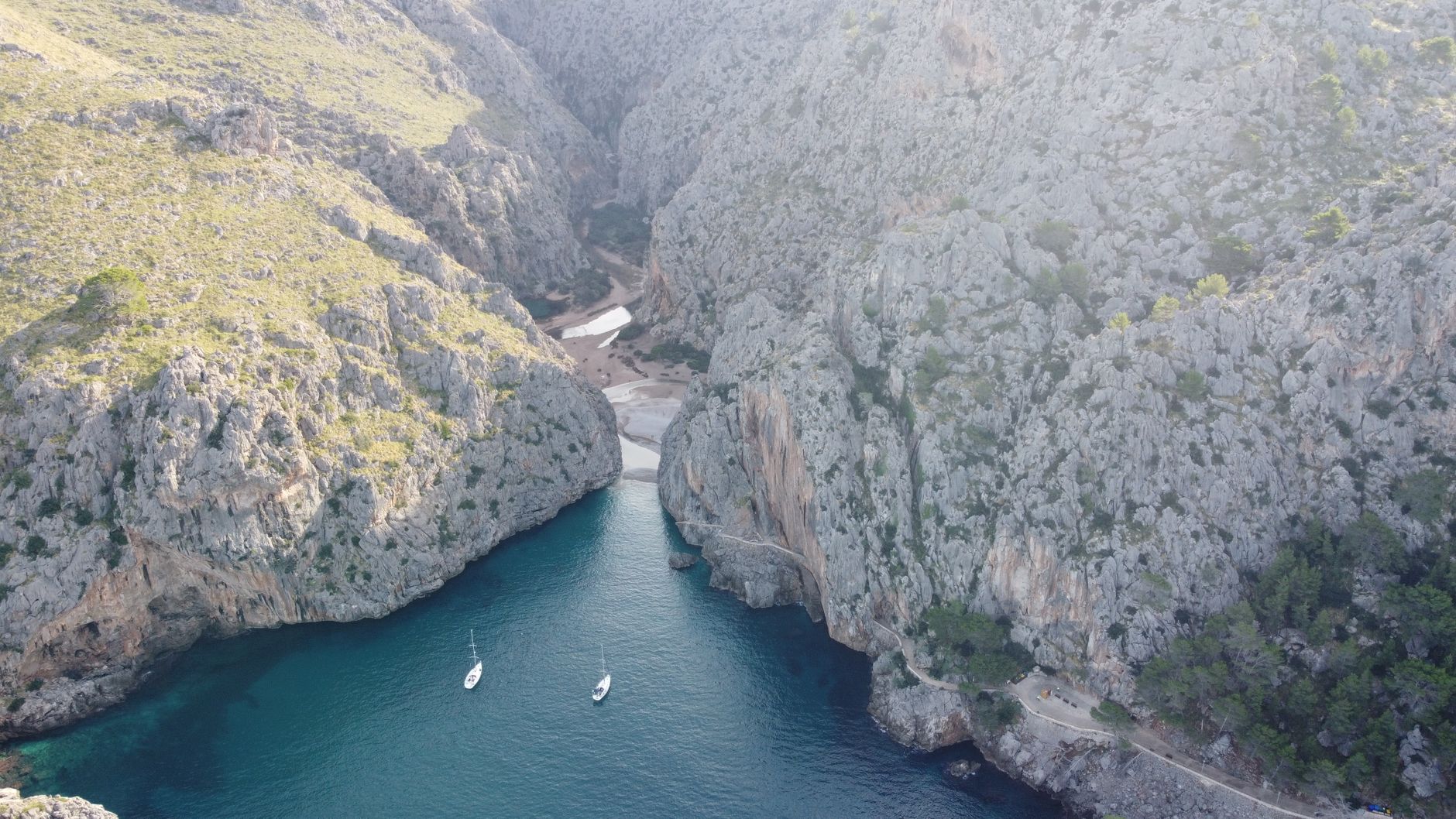 Aerial view of Sa Calobra cliffs and blue water in Mallorca