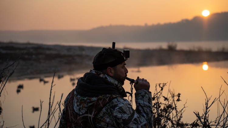 A Hunter At A Lakeside