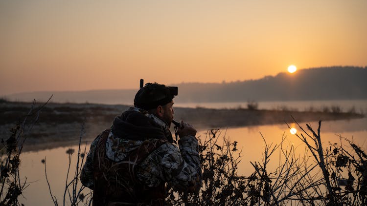 A Hunter At A Lakeside