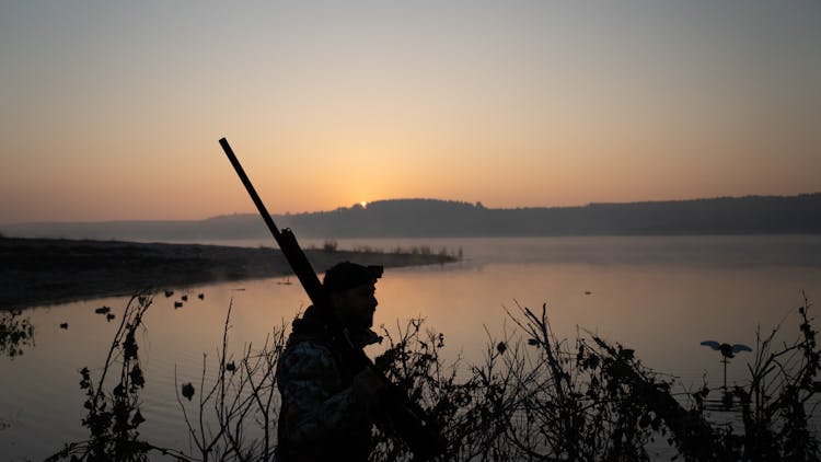 A Hunter At A Lakeside