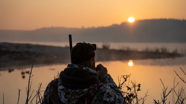 A Hunter At A Lakeside