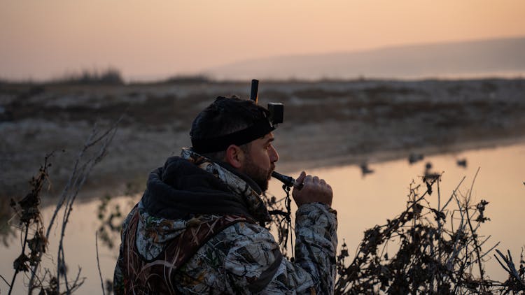 A Hunter At A Lakeside