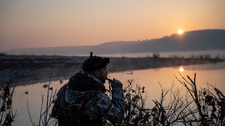 A Hunter At A Lakeside