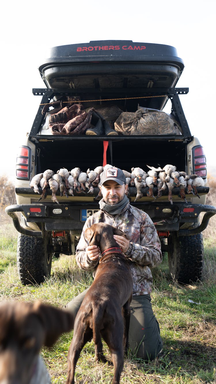 A Hunter With His Pet Dog