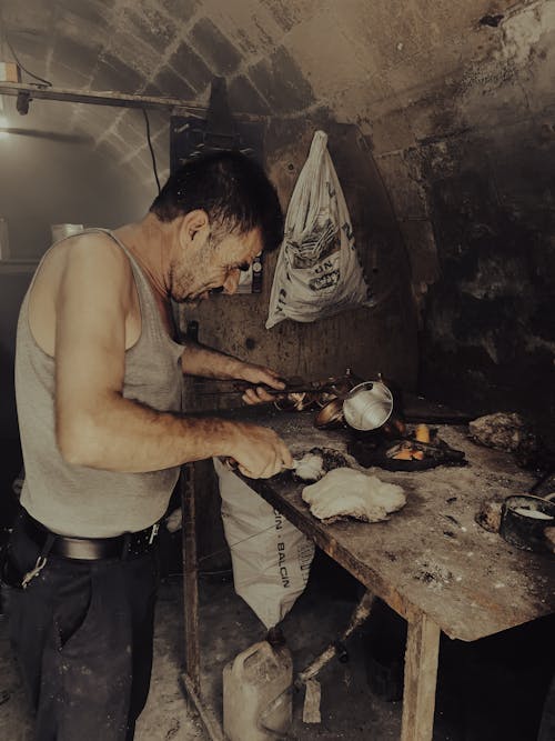 People Working in Blacksmith Workshop