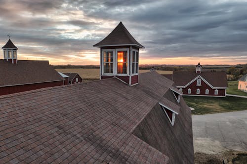 Бесплатное стоковое фото с Архитектурный, дома, закат