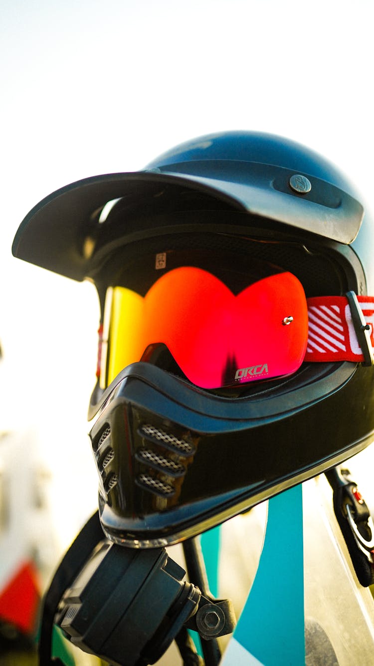 A Black Helmet With Sunglasses