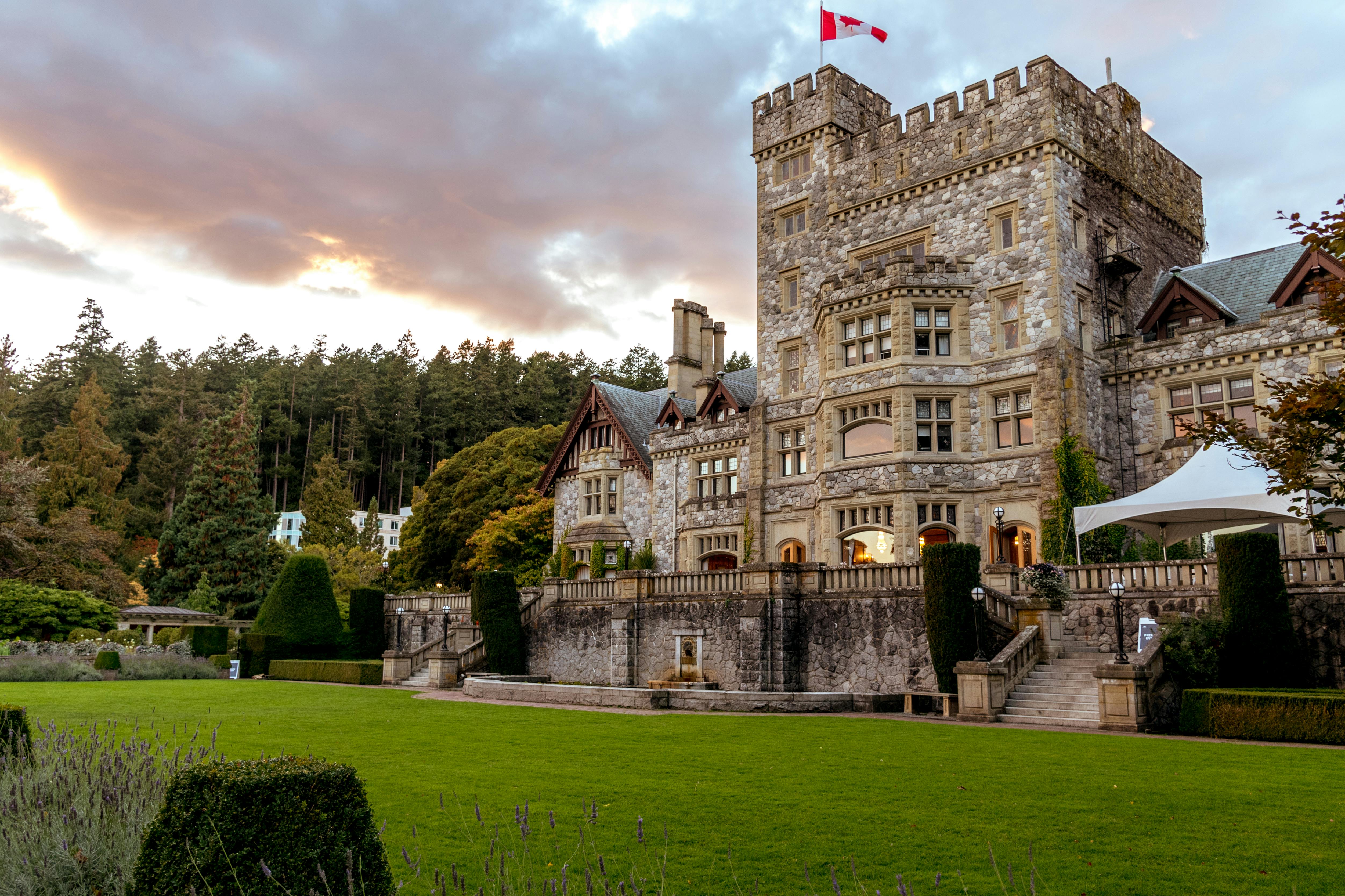 Stone Castle With Green Grass Front Yard · Free Stock Photo