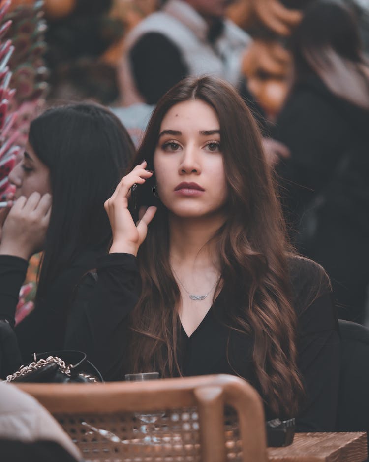 Portrait Of A Beautiful Woman Talking On The Phone