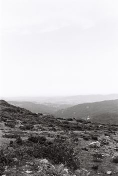 Black and white photograph of a mountainous landscape showcasing natural beauty.